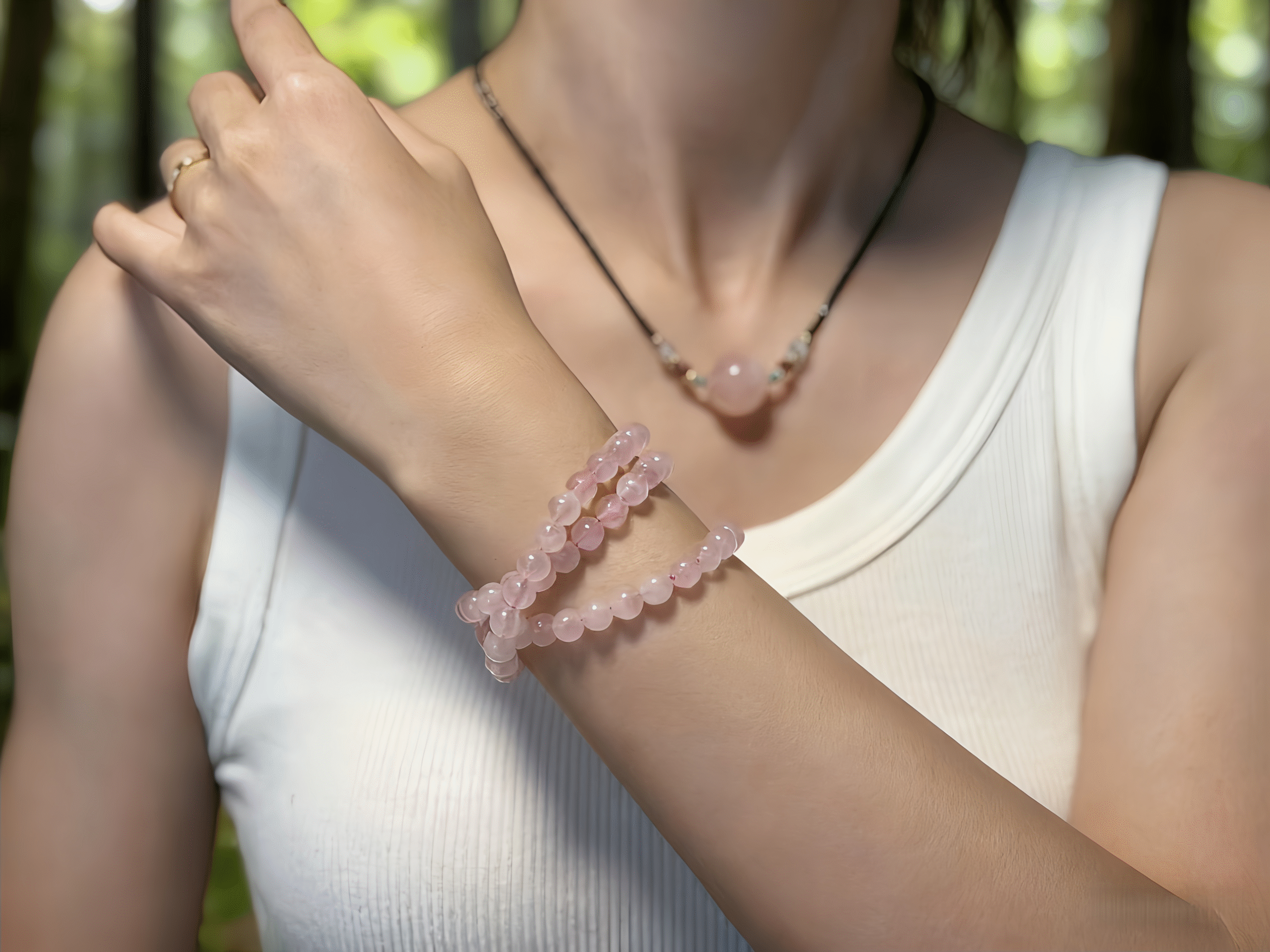 Rose Quartz Necklace Worn - Illuminating the Heart with Confident Radiance Close-up of Rose Quartz pendant, showing delicate texture and soft glow, a heart chakra amplifier.
